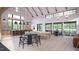 Open dining area with large windows, modern lighting, and views of the surrounding landscape at 2009 Abbeyhill Dr # 63, Raleigh, NC 27610