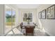 Inviting dining room with modern table, leather chairs, and sliding glass door access at 2009 Abbeyhill Dr # 63, Raleigh, NC 27610