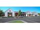 Community building exterior featuring modern farmhouse design, ample parking, and landscaping at 2009 Abbeyhill Dr # 63, Raleigh, NC 27610