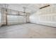Spacious two-car garage with overhead door and natural light at 2009 Abbeyhill Dr # 63, Raleigh, NC 27610