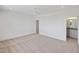 Bright bedroom with plush carpet, recessed lighting, ceiling fan, and an ensuite bathroom at 213 Westhampton Dr, Pittsboro, NC 27312