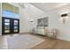 Open foyer with high ceilings, statement lighting and modern decor at 213 Westhampton Dr, Pittsboro, NC 27312