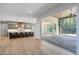Open floor plan featuring kitchen with an island that opens onto an outdoor dining area at 213 Westhampton Dr, Pittsboro, NC 27312