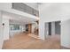 Expansive living room with fireplace and stairs to a loft area at 213 Westhampton Dr, Pittsboro, NC 27312