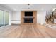 Open floorplan with a fireplace and stairs, and recessed lighting throughout at 213 Westhampton Dr, Pittsboro, NC 27312