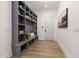 Organized mudroom with built-in shelving, bench seating, and storage baskets at 213 Westhampton Dr, Pittsboro, NC 27312