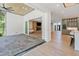 Spacious patio with stone floor and wooded view offering an outdoor retreat at 213 Westhampton Dr, Pittsboro, NC 27312