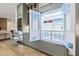 Modern kitchen refrigerator with a paneled exterior filled with drinks and open to display its contents at 213 Westhampton Dr, Pittsboro, NC 27312