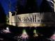 Elegant stone community sign at night, warmly lit and surrounded by lush landscaping at 213 Westhampton Dr, Pittsboro, NC 27312