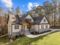 House exterior showcasing a front porch and landscaping at 143 Hook Dr # 23, Fuquay Varina, NC 27526