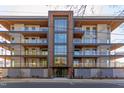 Stunning building facade showcasing multiple balconies, modern architecture, and a welcoming entrance at 600 N Roxboro St # 43, Durham, NC 27701