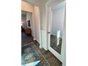 Home office with glass French door and wood-look tile floor at 141 Beacon Hill Rd # 13, Lillington, NC 27546