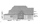 Two-story home with rear patio and large windows at 5209 Bent Leaf Dr, Raleigh, NC 27606