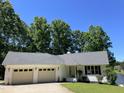 Charming single-story home with a two-car garage, front yard, and a welcoming entrance at 3309 Westcott Cir, Sanford, NC 27330