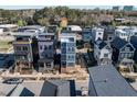 Three-story home offers a rooftop terrace and modern design in a vibrant, up-and-coming neighborhood at 618 Velma Hopkins Ln, Raleigh, NC 27603