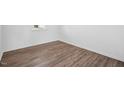 Bright bedroom featuring wood-look flooring at 292 Chestnut Oak Ln, Lillington, NC 27546