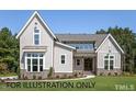 Charming home boasting gray siding, white trim, beautiful landscaping, and great curb appeal at 4905 Hidden Pasture Way, Zebulon, NC 27597