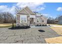 House exterior with stone and siding at 69 Browning Mill Dr, Wendell, NC 27591