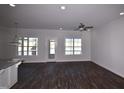 Bright living room featuring hardwood floors and patio access at 190 Brunswick Dr, Nashville, NC 27856