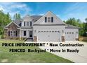 New construction home with fenced backyard and attached two-car garage at 21 Walnut Hall Ct, Selma, NC 27576