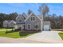 Inviting entryway with built-in bench and coat hooks at 83 Artic Circle, Garner, NC 27529