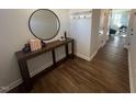 Bright entryway with wood-look floors and a console table at 176 Van Winkle St, Lillington, NC 27546