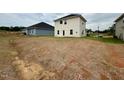 Image of a new home construction showing the backyard of the property at 316 Bishop Ln, Sanford, NC 27330