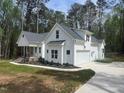 Beautiful single-Gathering home with attached garage and newly installed driveway at 30 Tamaran Ct, Spring Hope, NC 27882