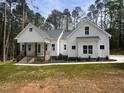 Charming single-Gathering home with attached garage and inviting covered porch at 30 Tamaran Ct, Spring Hope, NC 27882