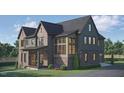 New construction home boasts a brick and siding exterior with a covered porch and manicured lawn at 1000 Marilyn Dr, Raleigh, NC 27607