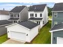 Charming two-story home with detached garage and beautiful landscaping at 9249 Kitchin Farms Way # 432, Wake Forest, NC 27587