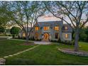 Beautiful stone and siding home with inviting walkway and professionally landscaped yard at 1641 Legacy Ridge Ln, Wake Forest, NC 27587