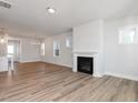 Spacious living room with fireplace and hardwood floors at 912 Allen Park Dr, Raleigh, NC 27604