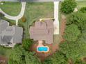 Bird's-eye view of a house with a backyard pool at 90 Brandon Dr, Lillington, NC 27546