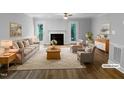 Bright, staged living room with fireplace, neutral tones, and ample natural light at 1432 Quarter Pt, Raleigh, NC 27615