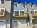 New townhouse with a front-facing garage and balcony offers modern living at 3006 Freewinds Way # 41, Cary, NC 27519