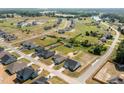 An aerial view of a large suburban neighborhood with many houses at 87 S Cousins Ct, Smithfield, NC 27577