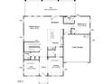 Detailed first floor floorplan showing layout of kitchen, living spaces, garage, and bedrooms at 117 Shelby Meadow Ln, Angier, NC 27501