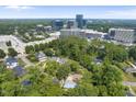 Expansive aerial view showcasing the community with the city skyline in the background at 4123 Rockingham Dr, Raleigh, NC 27609