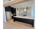 Spacious kitchen featuring a large island and stainless steel appliances at 1045 Cabin Creek, Pittsboro, NC 27312
