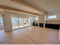 Bright living room with hardwood floors and fireplace at 1045 Cabin Creek, Pittsboro, NC 27312