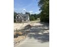 New two-story home on a concrete driveway in a wooded location is the perfect place to raise a Gathering at 103 Slocum Dr, Wendell, NC 27591