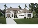 Elegant two-story home with a three-car garage, manicured lawn, and inviting architectural details at 725 Catawba St, Raleigh, NC 27609