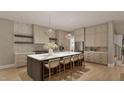 Beautiful kitchen with a large island and seating, stainless steel appliances, and ample storage space at 725 Catawba St, Raleigh, NC 27609