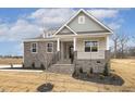 Charming house with stone facade and covered porch at 73 Jumper St, Wendell, NC 27591
