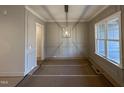 Dining room with wainscoting and hardwood floors at 30 Chestnut Oak Dr, Youngsville, NC 27596