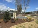 Alston Landing community entrance sign with landscaping at 3010 Freewinds Way # 43, Cary, NC 27519