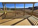 Covered patio or deck overlooking a backyard and surrounding neighborhood at 1109 Prominence Dr., Homesite 17, Durham, NC 27712