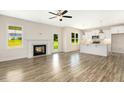 Spacious living room with hardwood floors and a fireplace at 51 Blackberry Ln, Benson, NC 27504