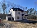 Two-story house under construction, showing the home's exterior features at 5037 Trotter Dr, Raleigh, NC 27603